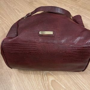 Beautiful burgundy Steve Madden hand bag